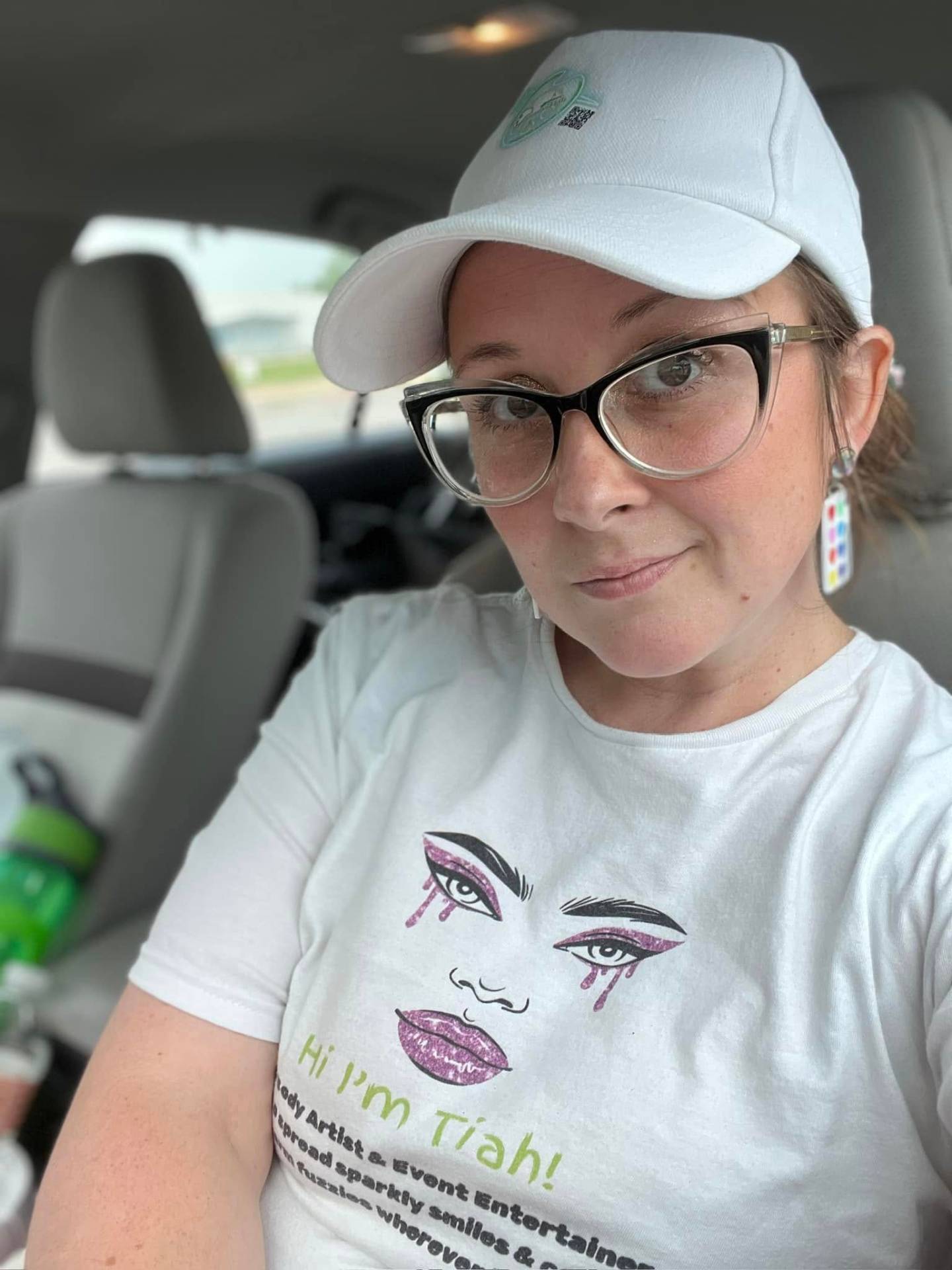 Tiah, founder of Creativitiah, in her branded Hi I'm Tiah tee ready for an event